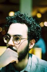 Curly Haired Guy With Round Glasses Brille
