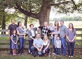 Family Photo Outfits Coordinated Outfits Can Tie A Family Photo Together But Give Each Person A Family Photo Pose Big Family Photos Large Family Portraits