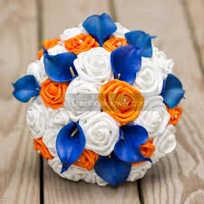 Complementary To The Bride White Royal Blue And Orange Roses Royal Blue Calla Lilies C Blue Wedding Flowers Orange Wedding Flowers Orange Wedding Bouquet