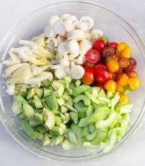 Hearts Of Palm Salad With Artichoke Hearts Cucumber And Avocado Recipe Hearts Of Palm Salad Vegetarian Recipes Healthy Vegan Recipes Healthy