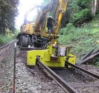 Excavator with Sleeper Changer the Sleepers Can Be Freed From the Ballast,  Removed and a New One Positioned
