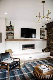 While it can be a bit tricky at first, modern farmhouse fireplace décor or general room décor can be easily implemented with the proper balance. A Modern Farmhouse Fireplace Update Emily Henderson