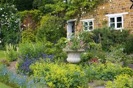 In this medium garden design, we've gone for a wonderful white slatted dividing wall with a large design mirrored water feature. Cottage Gardens How To Plan Yours Plus 14 Cottage Garden Ideas Real Homes