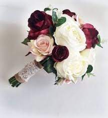 Burgundy and peach is one of the favorite color palettes for fall wedding flower arrangements. 470 Burgundy Wedding Flowers Ideas Burgundy Wedding Wedding Flowers Wedding
