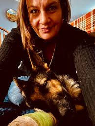 How to stop a German shepherd from breaking windows when people get too  close to the house?