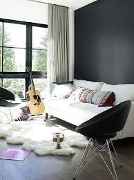 Pair it with warm whites or lighter shades of the same tone to create a warm, neutral bedroom that welcomes relaxation. Black Paint Ideas Benjamin Moore