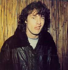 He gave up school at 15 and went to work for a soft porn. Angus Young