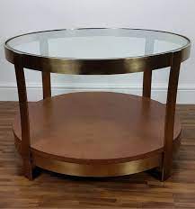 Browse from contemporary to traditional styles, including sleek chrome and glass coffee table designs to classic wood finishes. Morton Round Coffee Table With Glass Top Furniture Outlet Stores Uk Living Room Furniture Styles Living Room Furniture Traditional Living Room Furniture