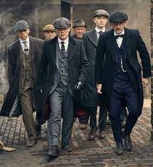 Peaky blinders™ is the online home for our iconic peaky blinders 8 piece newsboy cap. How To Dress Like A Peaky Blinder Hockerty Peaky Blinders Wallpaper Peaky Blinders Poster Peaky Blinders