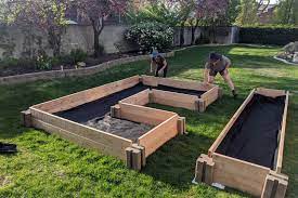 Layer down a few layers of cardboard, and fill the core with straw bales, leaves, grass clippings, or old twigs. These Lego Like Bricks Make Building A Raised Garden Bed A Snap Wirecutter