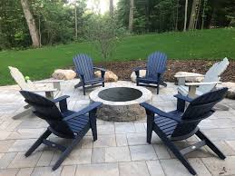 Or, go with reclining adirondack chairs coupled with ottomans. Gorgeous Adirondack Chairs Around Firepit Truax Outdoor Living Seashell Adirondack Chairs In P Stylish Outdoor Furniture Outdoor Rooms Outdoor Furniture Sets