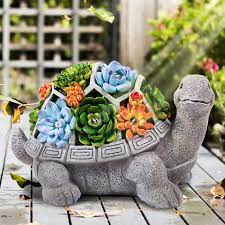 Check out our garden ornaments selection for the very best in unique or custom, handmade pieces from our garden decoration shops. Amazon Com Leses Garden Statues Turtle Outdoor Ornament Figurines With Solar Powered Lights Decorations For Patio Yard Lawn Gardening Gifts Kitchen Dining