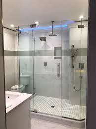 Custom Configuration On A Frameless Shower Enclosure With Glass To Glass Pivot Hinges Multi Co Glass Shower Enclosures Master Bathroom Shower Shower Ceilings