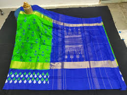 Green With Blue Border And Pallu Pure Ikkat Silk Saree Uppada big border sarees latest colors, uppada saree photos, uppada sarees images, lowest price offers. green with blue border and pallu pure ikkat silk saree