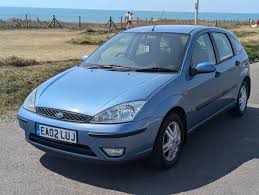 Image result for Light Ice Blue 2002 Ford