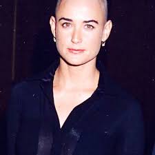 You can go with different haircuts and style with naturally curly hair. Buzz Cut Women