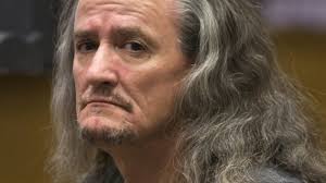 Homeless man denies Arizona priest killing