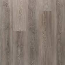 Applewood is a wonderfully varied floor with layers of soft color tones that blend with many furniture finishes. Woodfield Grey Oak Water Resistant Laminate 12mm 100709351 Floor And Decor
