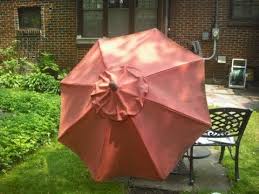You might be wondering whether the easiest and best way to dye a patio umbrella is to remove its fabric top and simply wash it in water with dye. Faded Outdoor Patio Umbrella Makeover Youtube