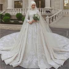 Generally, long pants or longer dresses and skirts are most appropriate. Discountluxury Muslim Wedding Dresses High Neck Lace Long Sleeves Sequins Beads Appliqued Wedding Dress With Veil Custom Made Vestidos De Novia From Huifangzou 282 26 Dhgate Com