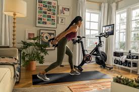 Once you've found the setting that best fits your body and posture, you simply turn the handle until it's tight. Peloton A Complete Guide To The Home Workout Platform