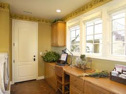 Check spelling or type a new query. This Utility Room Does Double Duty As A Home Office And A Laundry Room A Wall Of Windows Offers Tons Of Natural Light While A Built In Desk Home Laundry Room