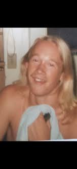 Ted Beck tries to comfort his daughter, Nichole, and held his daughter,  Christina, as a Seafair pirate greeted them in a 1974 parade. P-I File photo