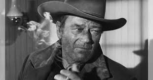 What caused John Wayne's cancer?