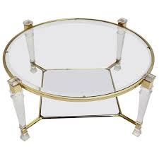 They are more clear and clean so as to make the interior space look larger. Hollywood Regency Vintage Gold Lucite Coffee Table In The Style Of Pierre Vandel For Sale At 1stdibs