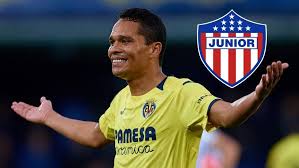 Es de color negra, con rayas blancas horizontales. Carlos Bacca El Dinero No Compra La Felicidad Volvere A Junior De Barranquilla Marca Claro Colombia