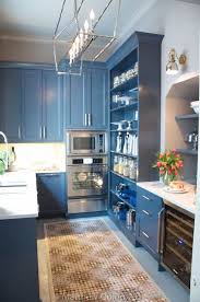 Blue Butler S Pantry Features Blue Cabinets Paired With White Marble Countertops Framing Bu Kitchen Design Gallery Kitchen Decor Sets Beautiful Kitchen Designs