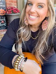 Statement earrings with bold contrast