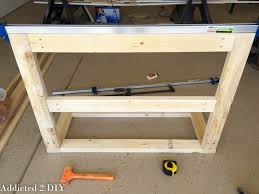 This diy step by step diy project is about how to build a double bike rack. Simple Diy Kid S Bicycle Rack With Helmet Storage Addicted 2 Diy