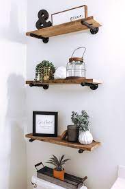 45 Brilliant Over The Toilet Storage Ideas That Make The Most Of Your Space In 2021 Shelf Decor Living Room Powder Room Decor Modern Farmhouse Powder Room