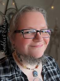 My solar system jewelry is one of my favorite things to make! 🥰 They  include Pluto, our moon, and the asteroid belt. [Image description: There  are four photos, featuring a necklace with