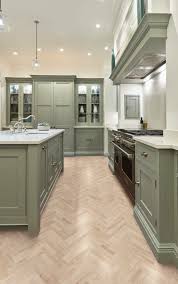 It boasts details such as a dark oak wood flooring and matching oak wood exposed ceiling trusses to give that classic antique feel, while the kitchen cabinets are made of solid walnut with a strong red undertone. Green Kitchen Cabinets Laptrinhx