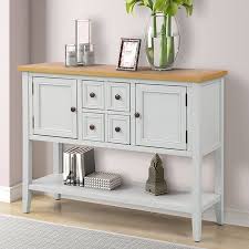 Crafted of poplar solids and engineered wood panels, in a crisp white painted finish, with physical distressing and lightly hand rubbed aged areas on the edges. Buffet Cabinet Sideboard 46 Dining Room Console Table W 4 Storage Drawers 2 Cabinets 1 Bottom Shelf Buffet Server Cabinet Kitchen Console Table Home Furn Sideboard Console Table Dining Room Console Sideboard Table