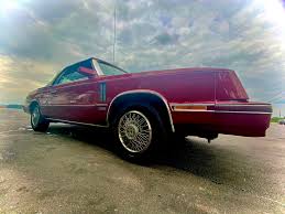Image result for Saddle Brown 1984 Chrysler