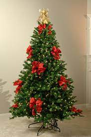 Ribbon Ribbon It S A Wrap With The Christmas Decorating Experts Gold Christmas Tree Decorations Easy Christmas Tree Decorations Creative Christmas Trees