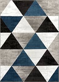 Silvers and greys will never go out of style, so you can count on the geometric greys trend to stand the test of time. Well Woven Arlo Tiles Blue Modern Triangle Pattern 3 X 5 3 3 X 5 Area Rug Abstract Geometric Carpet Buy Online In Tajikistan At Tajikistan Desertcart Com Productid 54551574