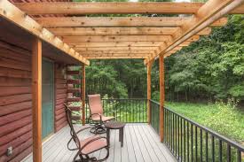 18 deck privacy ideas for a perfectly secluded outdoor retreat. Log Cabin Deck With Pergola Rustic Deck Grand Rapids By Thompson Remodeling Houzz