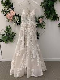 I'm a size 4 in street clothes, but was sized to a 10 in this dress. Martina Liana Ivory Moscato Moscato Lace Tulle Organza 1110 Feminine Wedding Dress Size 10 M Martina Liana Wedding Dress Wedding Dresses Wedding Dress Size 10