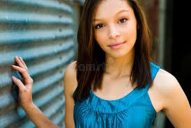 Teenage Girl with Autumn Advertising, Copy Space. Teenage Girl in Autumn  with Paper Stock Photo