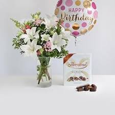 Create customized jewelry that reflects the style she has built through the years, and pair it with a box of gourmet sweets and a fresh birthday bouquet for a little pampering. Birthday Bundle Of Flowers Chocolates Candle Balloons And Bubbly Love Florist And Weddings Aberdeen Ltd Aberdeen Aberdeenshire
