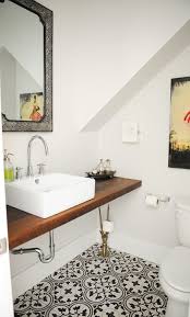 The first suggestion when it comes to small bathroom layouts is to build up, not out. 14 Genius Small Bathroom Design Ideas