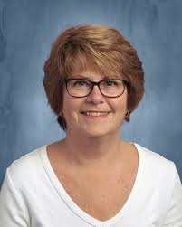 What type of bird builds a nest in a patio umbrella?