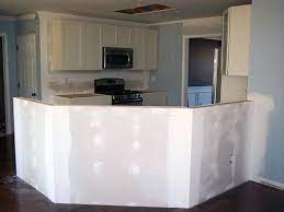 Installing A Half Wall Kitchen Island Half Wall Kitchen Half Wall Decor Basement Makeover