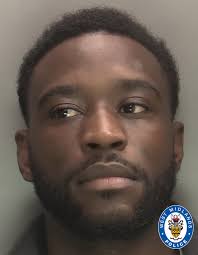 Moment violent masked gang bstorm travel agent armed with hammers and  knives