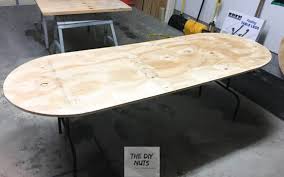 Make a small ergonomic groove on one of the longer sides of the teak wood plank as shown in the picture. Diy Folding Table How To Make An Inexpensive Diy Game Poker Table The Diy Nuts