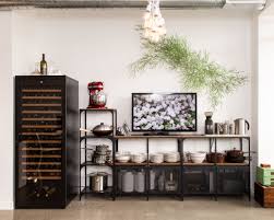 Our Boho Chic Toronto Loft Living Room With Polished Concrete Floors Shelving Units Ikea Fjallbo Wine Cellar E Living Room Loft Ikea Living Room Loft Living